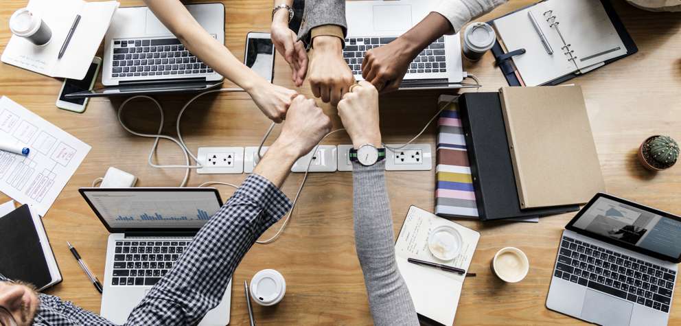 colleagues-giving-fist-bump.jpg colleagues-giving-fist-bump.jpg